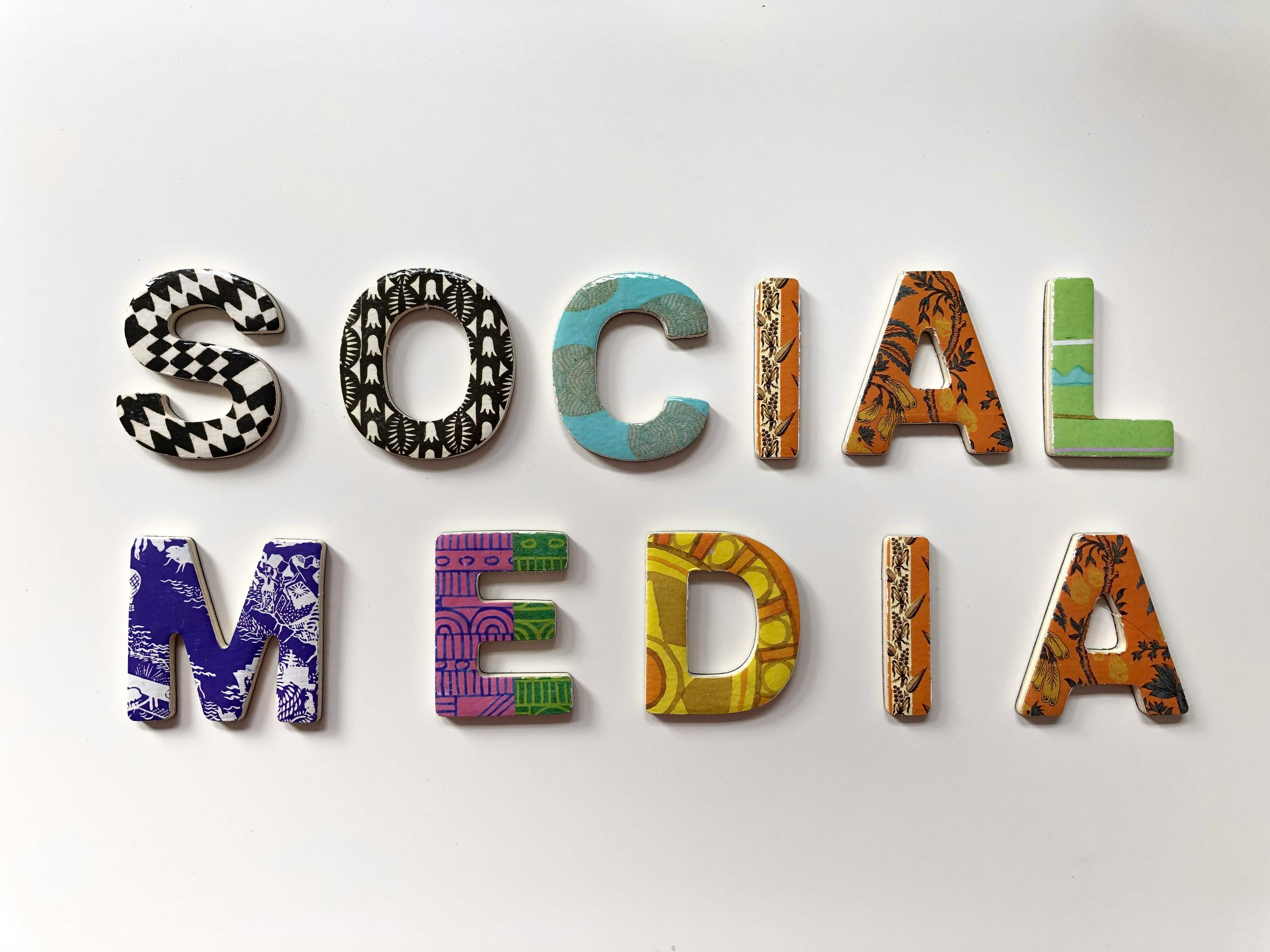 The words social media with patterened letters